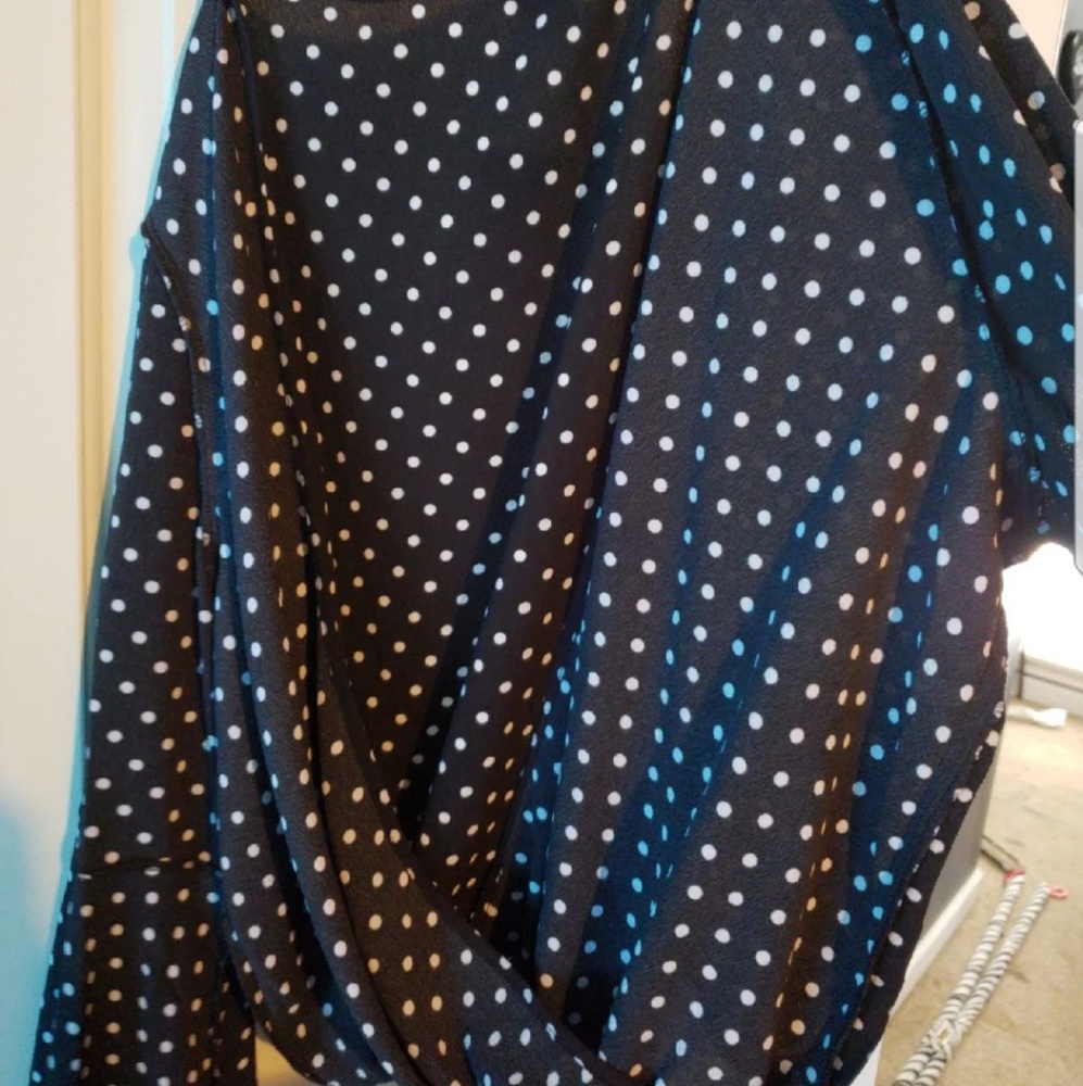 Polka dotted black shirt